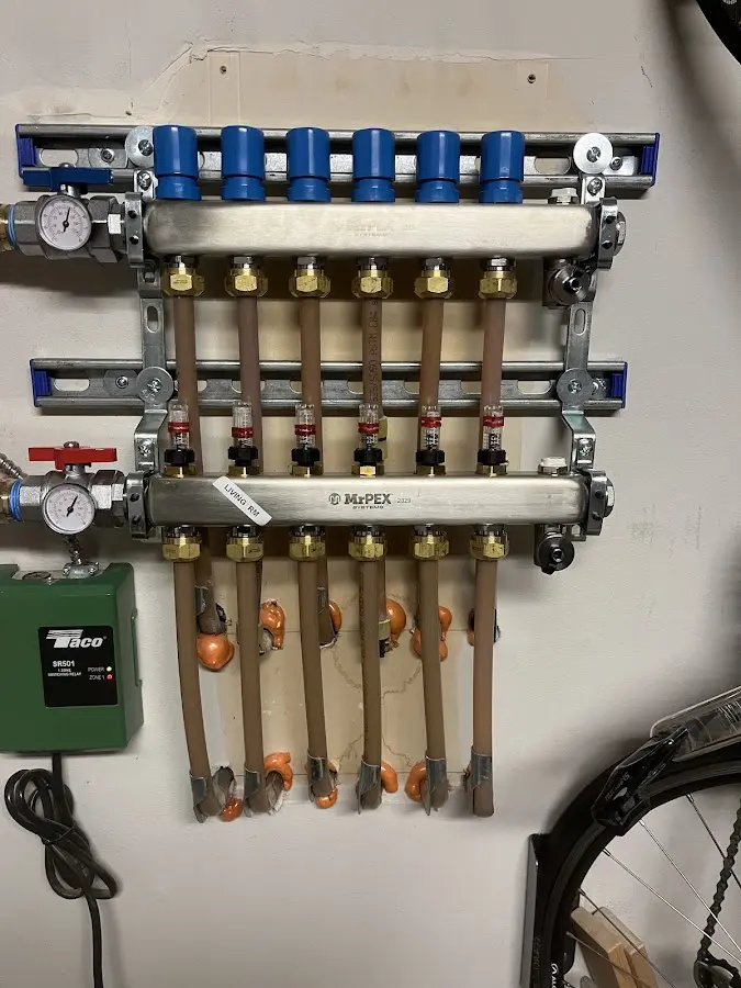 Plumber performing Sink Repair at a residential property in Aurora